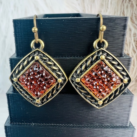 Gorgeous weighted brass tone Amber colored bling costume pierced earrings